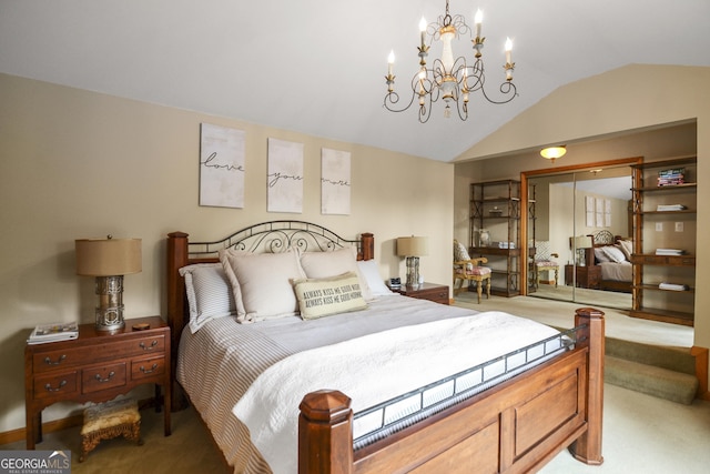 carpeted bedroom featuring vaulted ceiling, a closet, and a chandelier