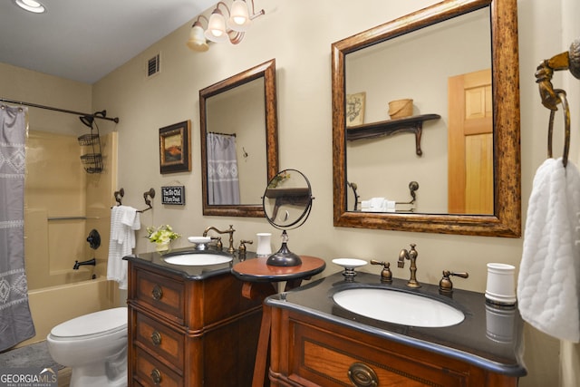 bathroom featuring shower / tub combo, visible vents, toilet, and vanity