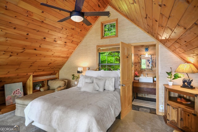bedroom featuring wood ceiling and high vaulted ceiling