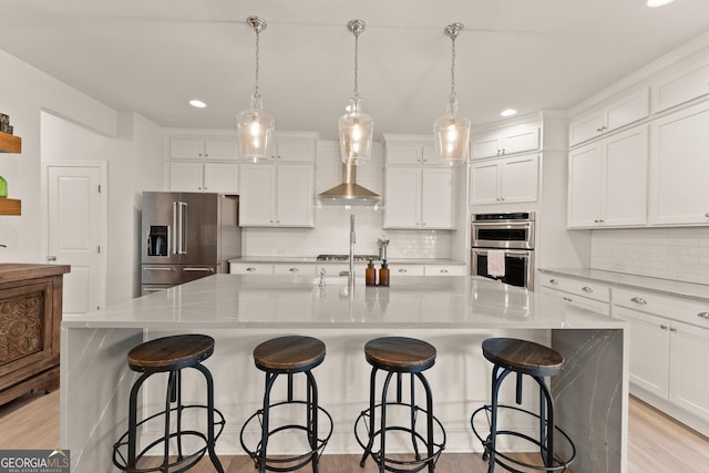 6635 Canyon Cv, Cumming, GA 30028 - kitchen with backsplash, white cabinetry, stainless steel appliances, and recessed lighting