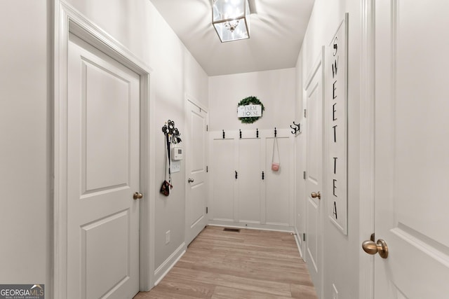 6635 Canyon Cv, Cumming, GA 30028 - entryway with light wood-style flooring and visible vents