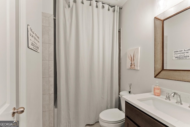 6635 Canyon Cv, Cumming, GA 30028 - bathroom with shower / bath combo with shower curtain, toilet, and vanity