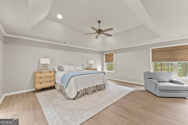6635 Canyon Cv, Cumming, GA 30028 - bedroom featuring baseboards, multiple windows, and a raised ceiling