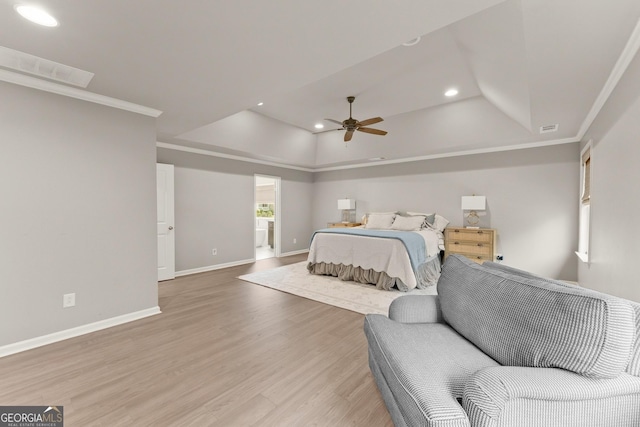 6635 Canyon Cv, Cumming, GA 30028 - bedroom featuring recessed lighting, light wood-style flooring, visible vents, and a raised ceiling