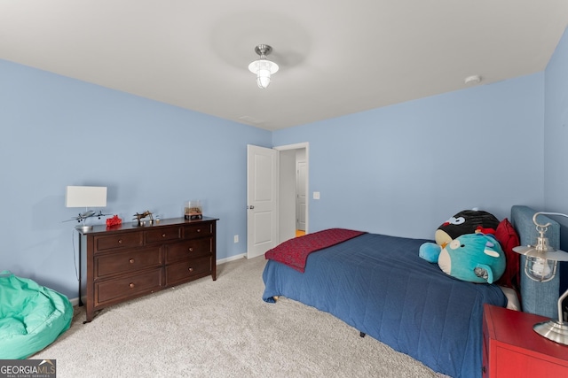 6635 Canyon Cv, Cumming, GA 30028 - bedroom featuring light carpet and baseboards