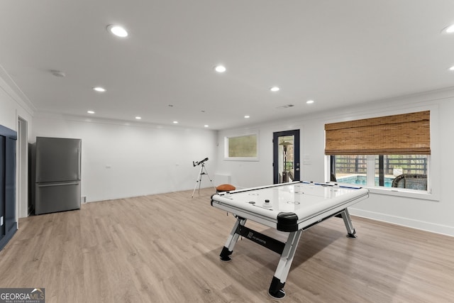 6635 Canyon Cv, Cumming, GA 30028 - game room with recessed lighting, light wood-type flooring, and crown molding
