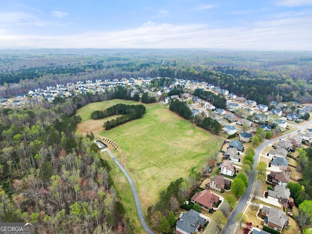 6635 Canyon Cv, Cumming, GA 30028 - drone / aerial view with a residential view and a wooded view