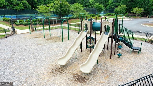 6635 Canyon Cv, Cumming, GA 30028 - community jungle gym featuring fence