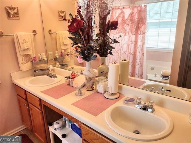 full bath featuring vanity and a shower with shower curtain