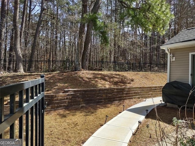 view of yard with a fenced backyard