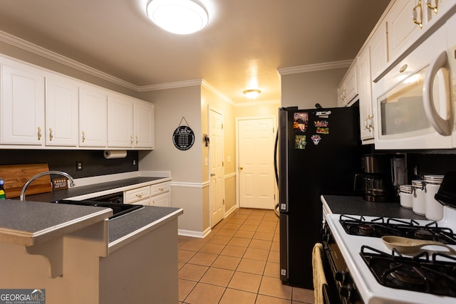 kitchen featuring range with gas stovetop, a peninsula, white microwave, a sink, and dishwasher