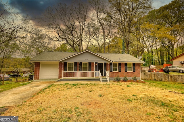 ranch-style house featuring fence, an attached garage, brick siding, and concrete driveway