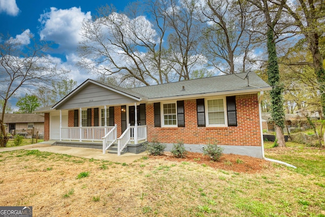 single story home with a front lawn, covered porch, brick siding, and roof with shingles