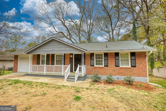 single story home with brick siding, a porch, roof with shingles, and an attached garage