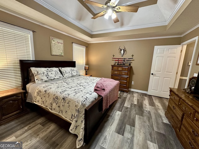 4100 Jewel Rdg, Monroe, GA 30655 - bedroom featuring a raised ceiling, dark wood-type flooring, crown molding, ceiling fan, and baseboards