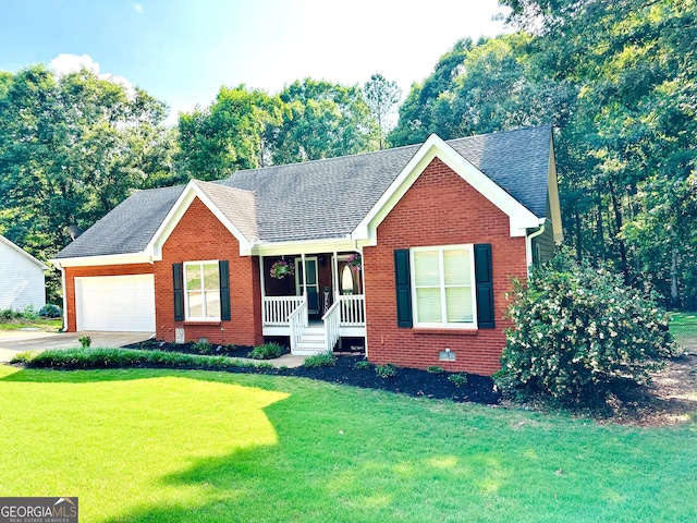 4100 Jewel Rdg, Monroe, GA 30655 - ranch-style home featuring a front lawn, covered porch, brick siding, and a shingled roof