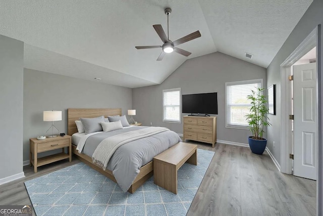 830 Buffington Way, Canton, GA 30115 - bedroom featuring vaulted ceiling, wood finished floors, visible vents, and baseboards
