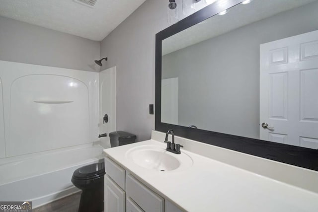 830 Buffington Way, Canton, GA 30115 - bathroom with toilet, shower / bathing tub combination, visible vents, wood finished floors, and vanity