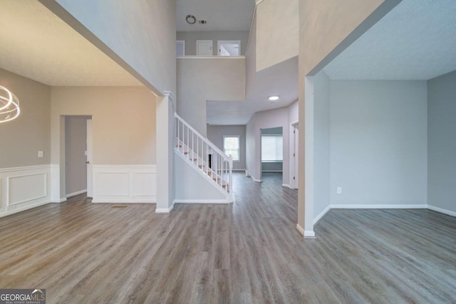 830 Buffington Way, Canton, GA 30115 - foyer featuring wainscoting, baseboards, wood finished floors, and stairs