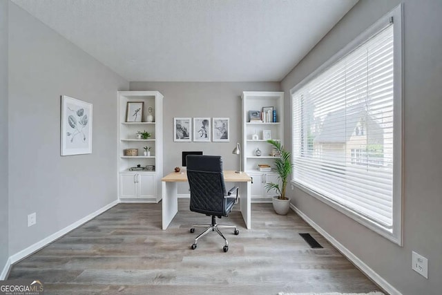 830 Buffington Way, Canton, GA 30115 - office space with baseboards, wood finished floors, and visible vents
