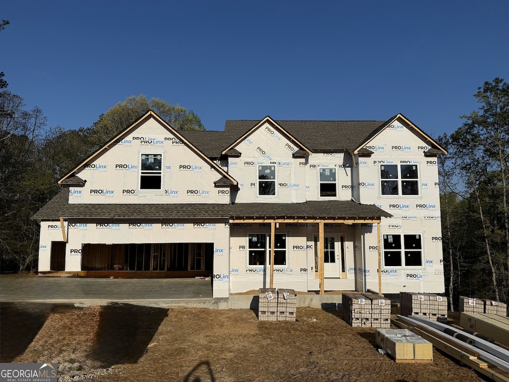1078 Birch Way, Loganville, GA 30052 - property in mid-construction with a garage, driveway, and roof with shingles