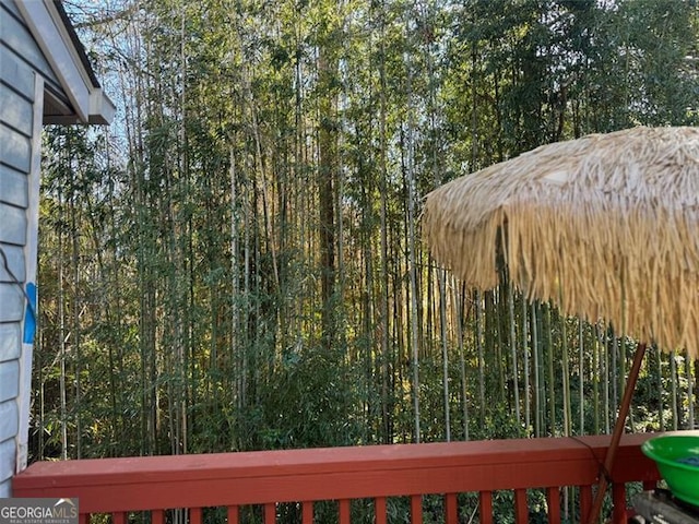 view of yard featuring a balcony