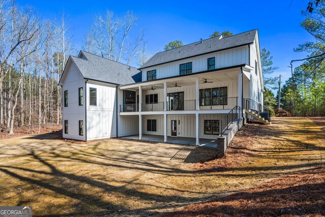 18390 Birmingham Hwy, Alpharetta, GA 30004 - back of house featuring board and batten siding, a patio, a shingled roof, and ceiling fan