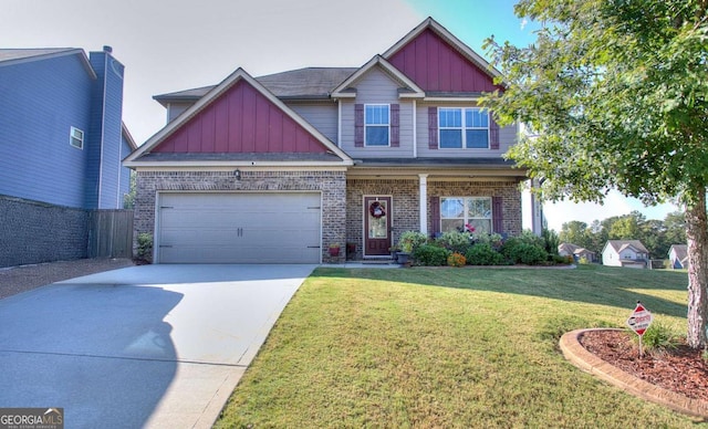 craftsman inspired home featuring board and batten siding, brick siding, concrete driveway, and a front yard