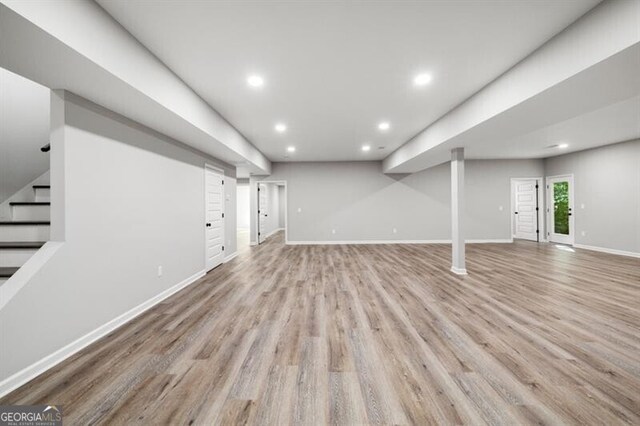 1590 Highland Farm Dr, Suwanee, GA 30024 - below grade area with recessed lighting, light wood-style floors, baseboards, and stairs
