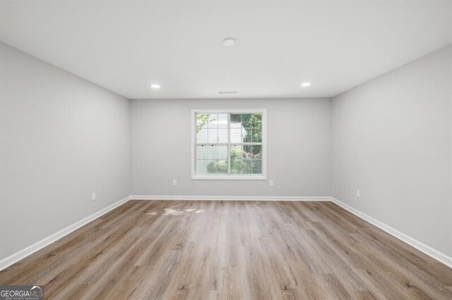 1590 Highland Farm Dr, Suwanee, GA 30024 - empty room featuring wood finished floors, baseboards, and recessed lighting