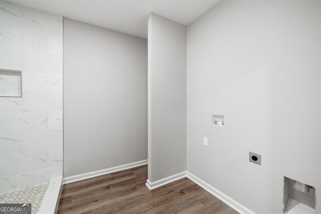 1590 Highland Farm Dr, Suwanee, GA 30024 - clothes washing area featuring electric dryer hookup, wood finished floors, hookup for a washing machine, and baseboards