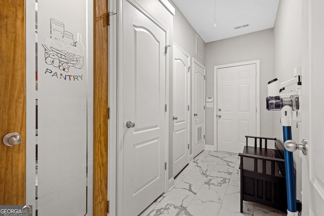 2105 Rotunda Ct, Conyers, GA 30094 - corridor featuring marble finish floor and visible vents