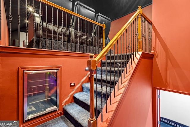 2105 Rotunda Ct, Conyers, GA 30094 - staircase with carpet flooring