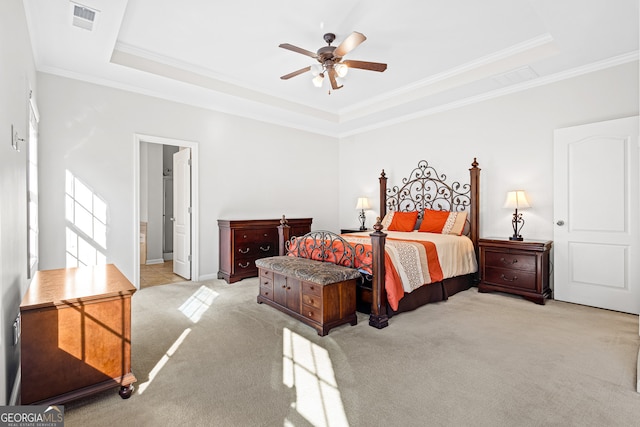 2105 Rotunda Ct, Conyers, GA 30094 - bedroom with a tray ceiling, ornamental molding, and light colored carpet