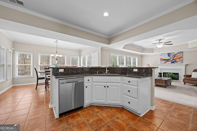 1803 Gold Finch Way, Lawrenceville, GA 30043 - kitchen with stainless steel dishwasher, a sink, dark tile patterned flooring, a chandelier, and a ceiling fan