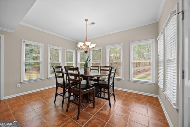 1803 Gold Finch Way, Lawrenceville, GA 30043 - tiled dining room featuring ornamental molding, a chandelier, and baseboards