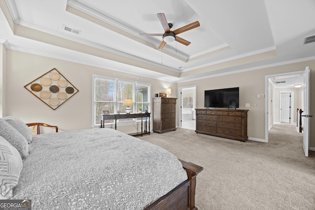 1803 Gold Finch Way, Lawrenceville, GA 30043 - carpeted bedroom with a raised ceiling, crown molding, baseboards, connected bathroom, and ceiling fan