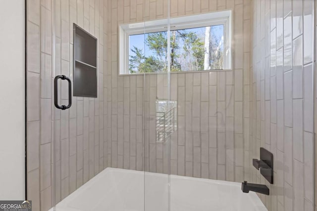 bathroom featuring enclosed tub / shower combo