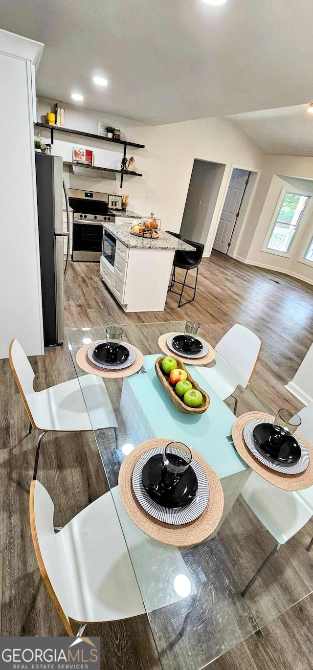 dining space with light wood-style floors