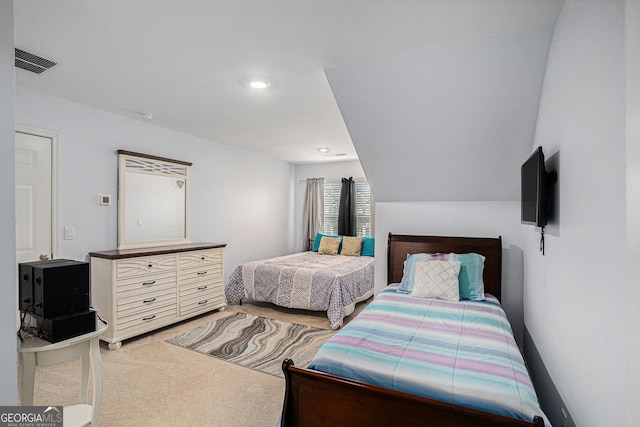 carpeted bedroom with recessed lighting and visible vents
