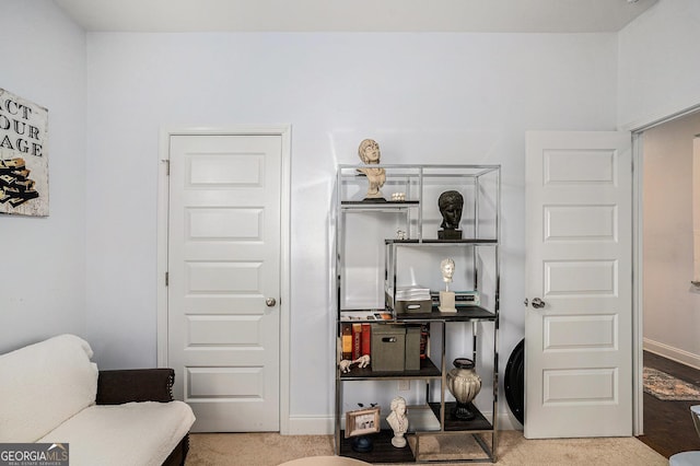interior space featuring baseboards