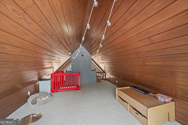 bonus room featuring wooden walls, carpet floors, and wooden ceiling
