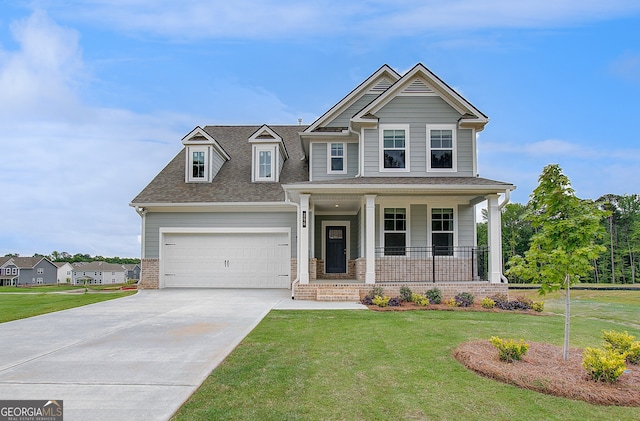 255 Arnewood Cir, Mcdonough, GA 30253 - craftsman-style home with a porch, driveway, a front lawn, and a shingled roof