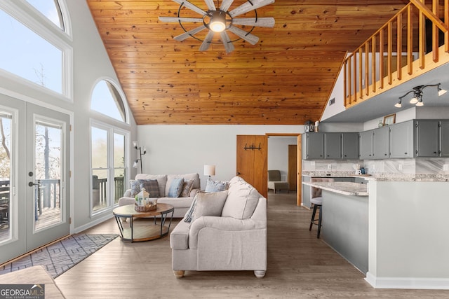 109 Shelton Ln, Eatonton, GA 31024 - living area with light wood finished floors, french doors, and ceiling fan