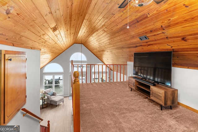 109 Shelton Ln, Eatonton, GA 31024 - living area featuring stairway, wood ceiling, wood finished floors, lofted ceiling, and baseboards