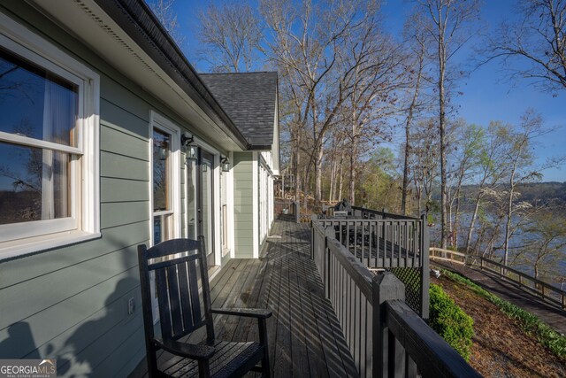 109 Shelton Ln, Eatonton, GA 31024 - view of front of house featuring cooling unit, a shingled roof, driveway, and a chimney