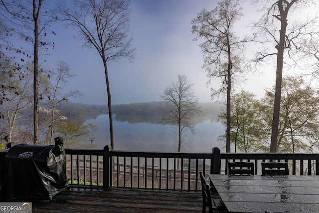 109 Shelton Ln, Eatonton, GA 31024 - rear view of house featuring stairway, a deck, a sunroom, and a chimney