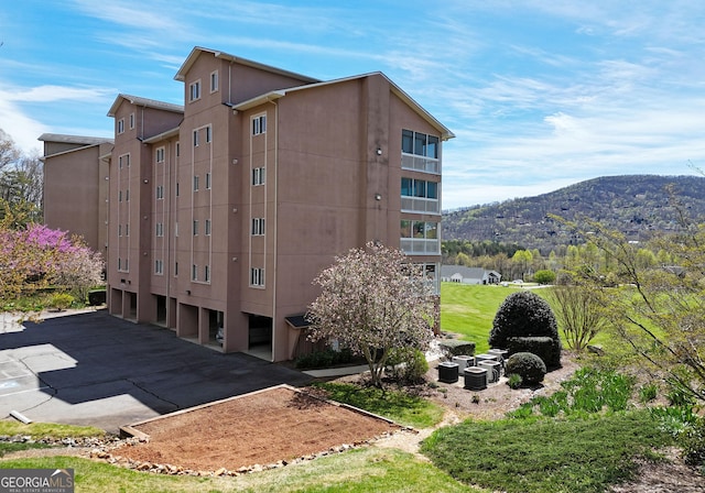 3112 Allison Ct, Young Harris, GA 30582 - view of building exterior featuring a garage and a mountain view