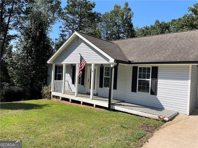 370 Rainey Dr, Dawsonville, GA 30534 - view of front of home featuring a shingled roof, covered porch, and a front yard