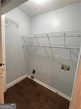 370 Rainey Dr, Dawsonville, GA 30534 - washroom featuring baseboards, washer hookup, dark wood-style flooring, and laundry area